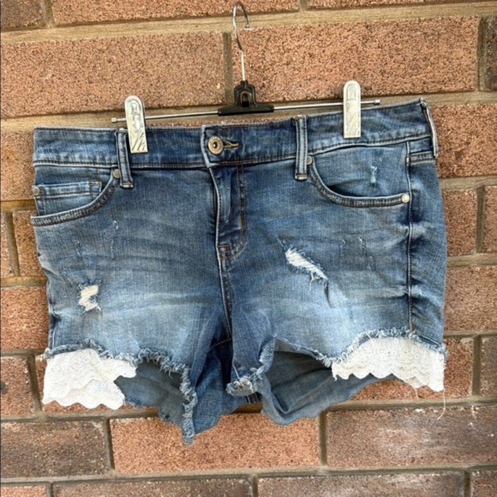 Torrid distressed Blue Jean Shorts with side lace detail
